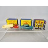 Matchbox - Three boxed Matchbox vehicles and accessories.