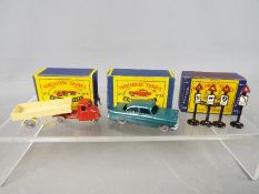 Matchbox - Three boxed Matchbox vehicles and accessories.