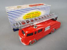 Dinky Toys - A boxed Dinky Toys #955 Fire Engine with Windows and Extending Ladder.