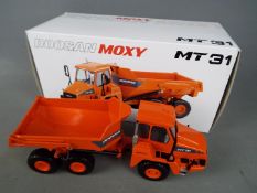 NZG - A boxed diecast 1:50 scale NZG #820 Doosan Moxy MT31 Dump Truck.