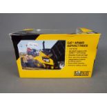 Norscot - A boxed 1:50 scale diecast Norscot #55259 Caterpillar AP600D Ashalt Paver.