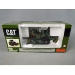 Norscot - A boxed 1:50 scale diecast Norscot #55110 Caterpillar D8R Series II Military Track - Type