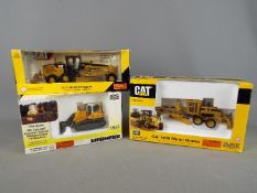 Norscot - A collection of three boxed 1:50 scale diecast construction vehicles by Norscot.