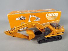 Conrad - A boxed diecast 1:50 scale Conrad #2912 Case CX800 Hydraulic Excavator.