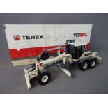 NZG - A boxed 1:50 scale diecast NZG #703 Terex TG190A Motor Grader.