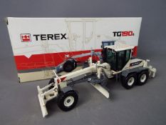 NZG - A boxed 1:50 scale diecast NZG #703 Terex TG190A Motor Grader.