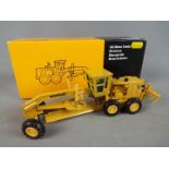 NZG - A boxed diecast 1:50 scale NZG #387 Caterpillar 16G Motor Grader.