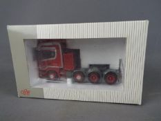 NZG - A boxed 1:50 scale diecast NZG #717/02 Scania 4 Axle Tractor Unit.