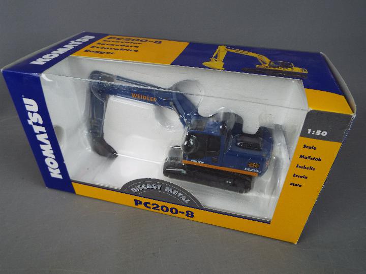 NZG - A boxed diecast 1:50 scale NZG #804 Komatsu PC210LC 'Wiedler' Crawler Excavator.