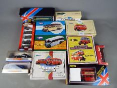 Corgi, Solido, Matchbox Dinky - 12 boxed diecast model vehicles.