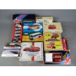 Corgi, Solido, Matchbox Dinky - 12 boxed diecast model vehicles.