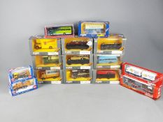Corgi, Siku, Herpa, Schuco - A collection of 15 boxed diecast model vehicles in several scales.