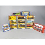 Corgi, Siku, Herpa, Schuco - A collection of 15 boxed diecast model vehicles in several scales.