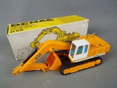 NZG - A boxed diecast 1:50 scale NZG #273 Demag Hydraulic Excavator.