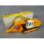 NZG - A boxed diecast 1:50 scale NZG #273 Demag Hydraulic Excavator.