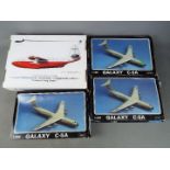 Model plane kits - a collection of four model plane kits to include a Starfix plastic model kit,