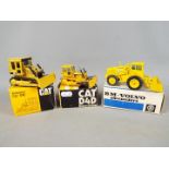 NZG - A collection of three boxed diecast 1:50 scale scale construction vehicles by NZG.