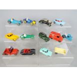 Dinky Toys, Corgi Toys - A collection of 12 unboxed diecast vehicles mainly by Dinky Toys.