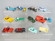 Dinky Toys, Corgi Toys - A collection of 12 unboxed diecast vehicles mainly by Dinky Toys.