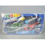 Thunderbirds - a Thunderbirds are Go 4 piece Vehicle Super Set comprising TB1, TB2,