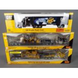 Norscot - Three boxed diecast 1:50 scale trucks by Norscot.