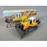 Conrad - A boxed diecast 1:50 scale Conrad #2808 Liebherr PR754 Litronic Crawler Tractor.