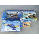 Revell - a collection of four Revell plastic model kits to include a McDonald Douglas DC-10 model