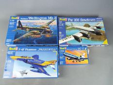 Revell - a collection of four Revell plastic model kits to include a McDonald Douglas DC-10 model