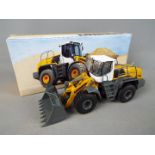 Conrad - A boxed 1:50 scale diecast Conrad #2443 Liebherr L576 Radlader Wheel Loader.