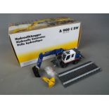 NZG - A boxed diecast 1:50 scale NZG #803/04 Liebherr Litronic A900 C ZW Hydraulic Excavator .