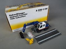 NZG - A boxed diecast 1:50 scale NZG #803/04 Liebherr Litronic A900 C ZW Hydraulic Excavator .