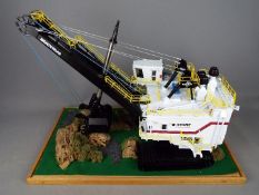 TWH Collectibles - An unboxed 1:50 scale TWH Collectibles Bucyrus 495 HF Electric Mining Shovel.