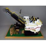 TWH Collectibles - An unboxed 1:50 scale TWH Collectibles Bucyrus 495 HF Electric Mining Shovel.