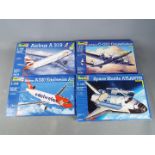 Revell - a collection of four plastic model kits to include an Airbus A 319 model No.