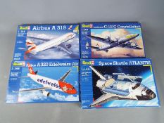 Revell - a collection of four plastic model kits to include an Airbus A 319 model No.