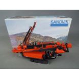 Bymo - A boxed Bymo diecast 1:50 scale Sandvik DI600 Piling and Drilling Rig.