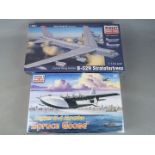 Minicraft Model Kits - a collection of two all plastic model kits to include a Hughes F-4 Hercules