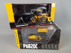 Motorart - Two boxed diecast construction vehicles in 1:50 scale by Motorart.
