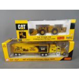 Norscot - Two boxed diecast 1:50 scale vehicles by Norscot.