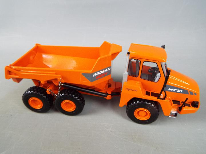 NZG - A boxed diecast 1:50 scale NZG #820 Doosan Moxy MT31 Dump Truck. - Image 2 of 4