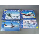 Revell - a collection of four plastic model kits to include a Boeing 737-800 Air Berlin and