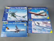 Revell - a collection of four plastic model kits to include a Boeing 737-800 Air Berlin and