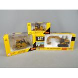 Norscot - A collection of three boxed 1:50 scale diecast construction vehicles by Norscot.