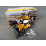 NZG - A boxed diecast 1:50 scale NZG #775 Liebherr PR764 Litronic Crawler Tractor.