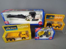 Siku, Volvo - Four boxed diecast 1:50 scale construction vehicles.