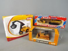 Shinsei, Ertl, Joal - Three boxed diecast construction vehicles in 1:50 scale.