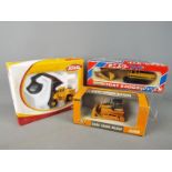 Shinsei, Ertl, Joal - Three boxed diecast construction vehicles in 1:50 scale.