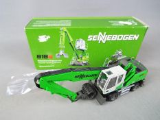 Conrad - A boxed Conrad #2944 diecast 1:50 scale Sennebogen Material Handling Machine.