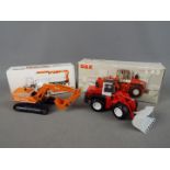 Conrad - Two boxed diecast 1:50 scale construction vehicles by Conrad.