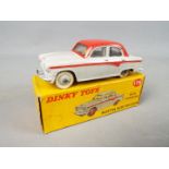 Dinky Toys - A boxed Dinky Toys #176 Austin A105 Saloon with Windows.
